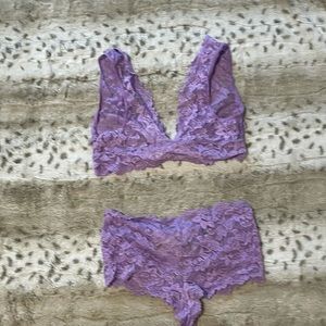 Deep V lace bra with satin ties and peekaboo panty